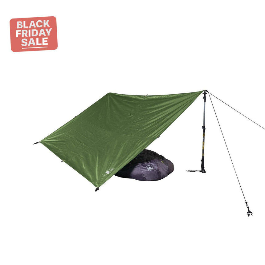 Green camping tarp with a stake and Black Friday sale label on a white background