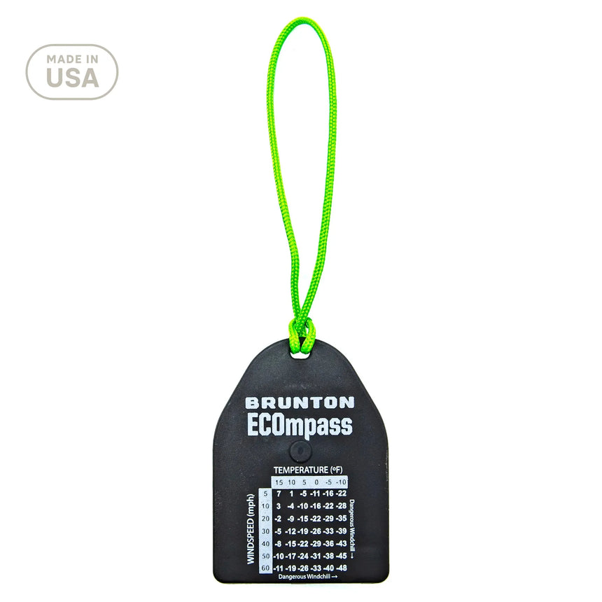 Black Brunton ECompass with green string on a white background