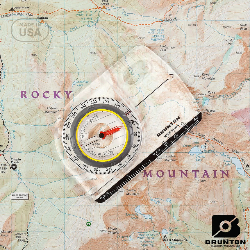 Brunton compass on a topographic map with 'Rocky Mountain' text