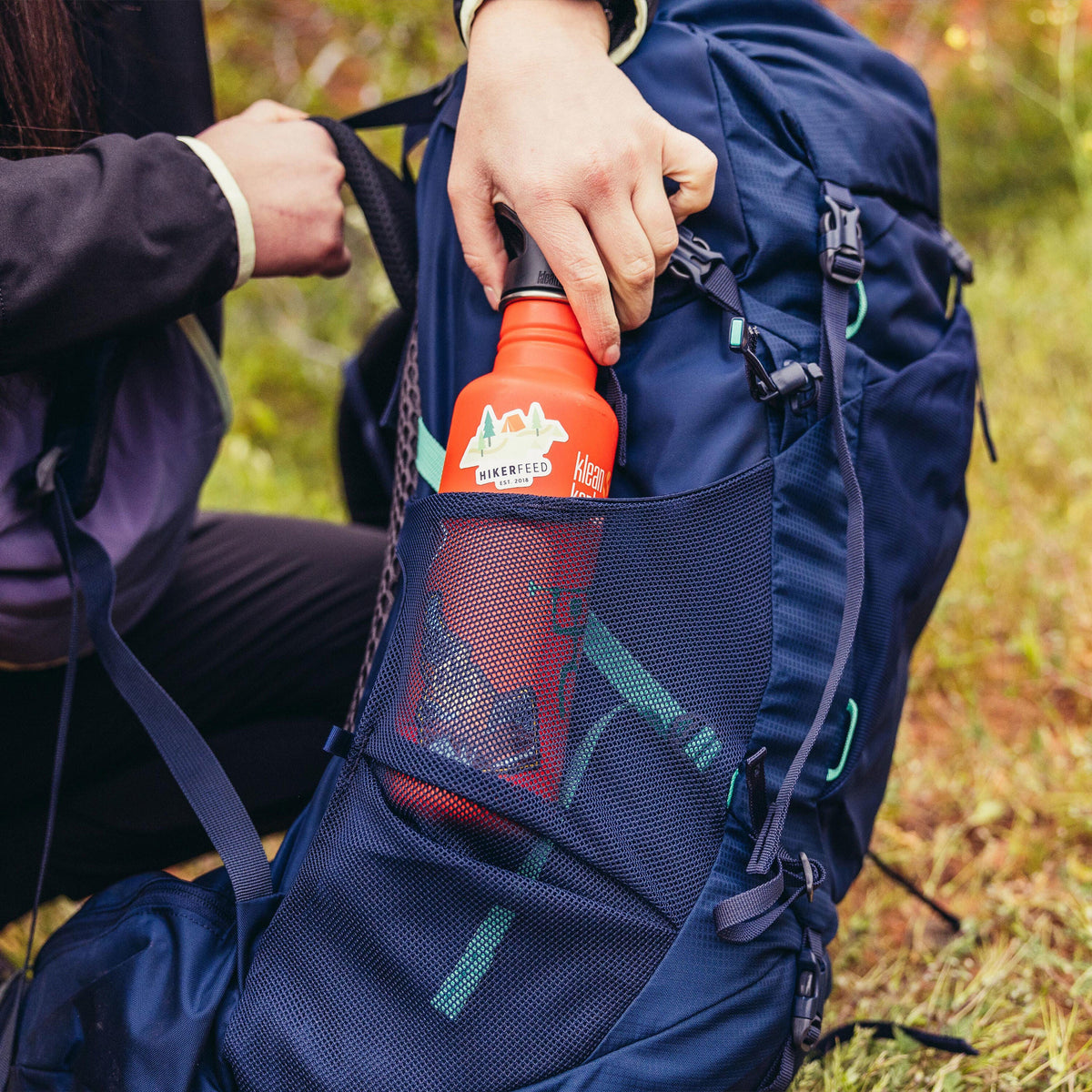 Gregory Amber 54 Dual-Side Mesh Pockets with side trail access and compression straps for water bottles