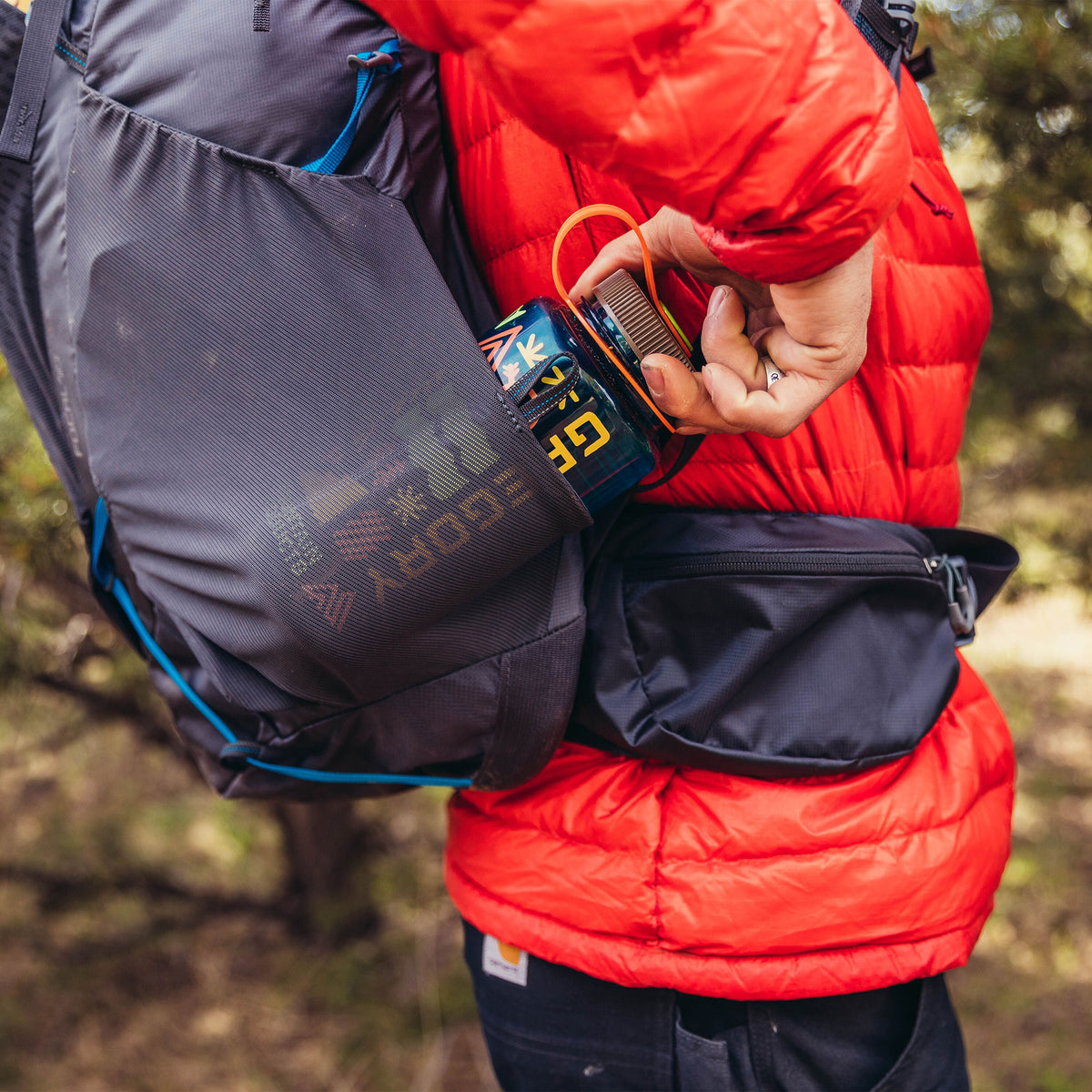 Gregory Focal 48 RC Side Stretch-Mesh Pockets - side trail access with pass-through compression