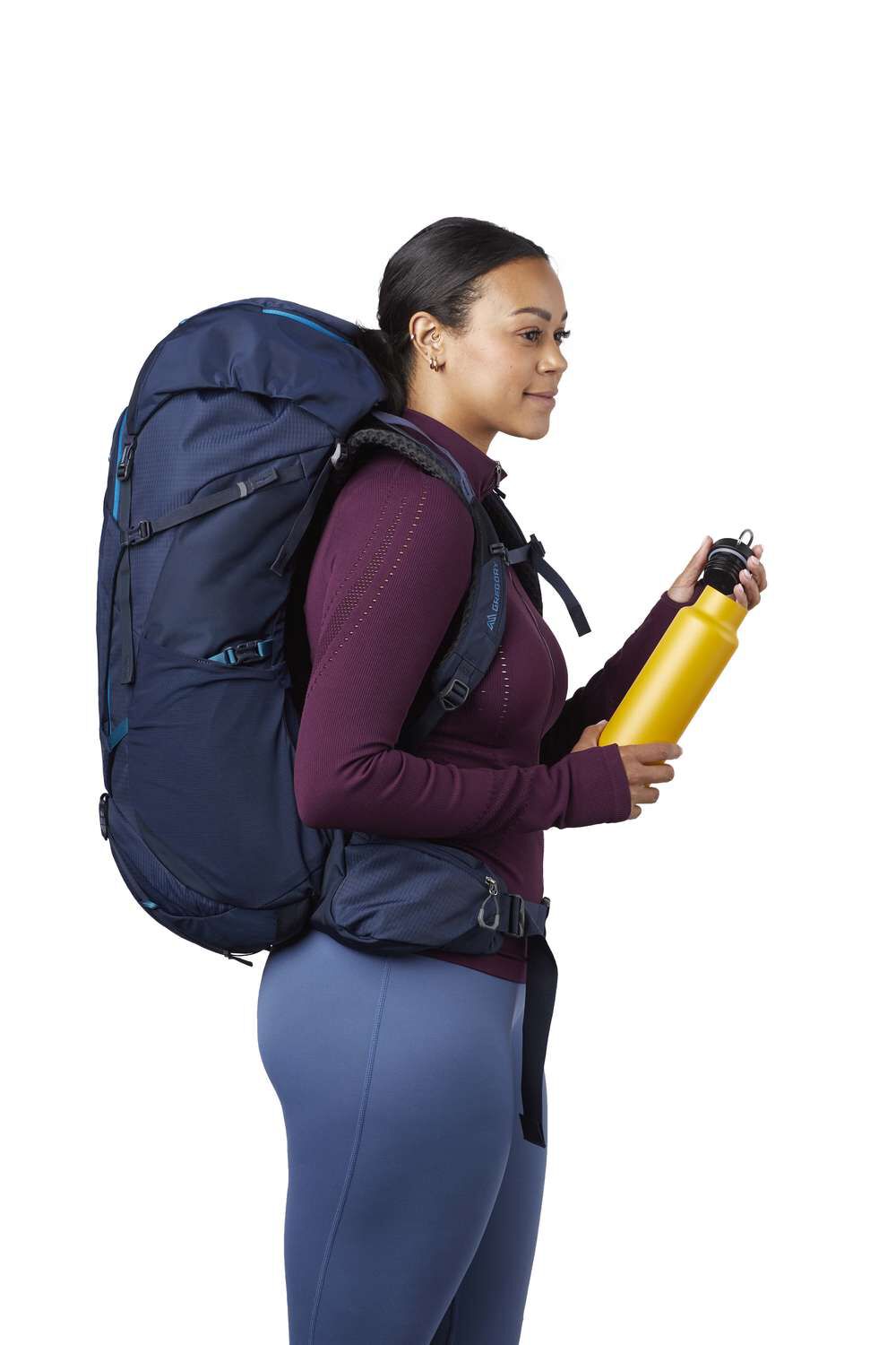 Gregory Jade 53L Side View - showing stretch mesh pockets and sleeping bag compartment access