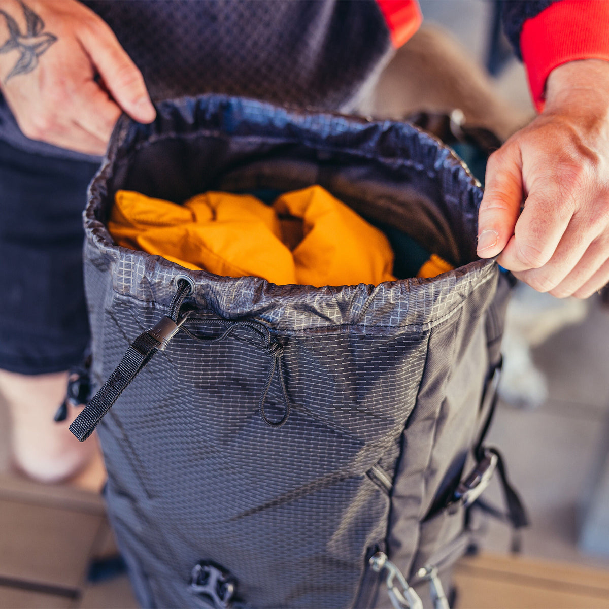 Gregory Nano 28L Drawstring Main Compartment - top-loading access with zippered top pocket