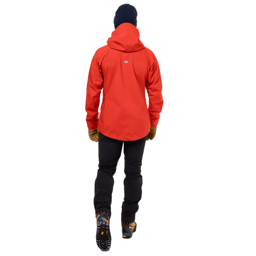 Mountain Equipment Tupilak Women's GORE-TEX Jacket in Chili Red - Hood Over Helmet on Model
