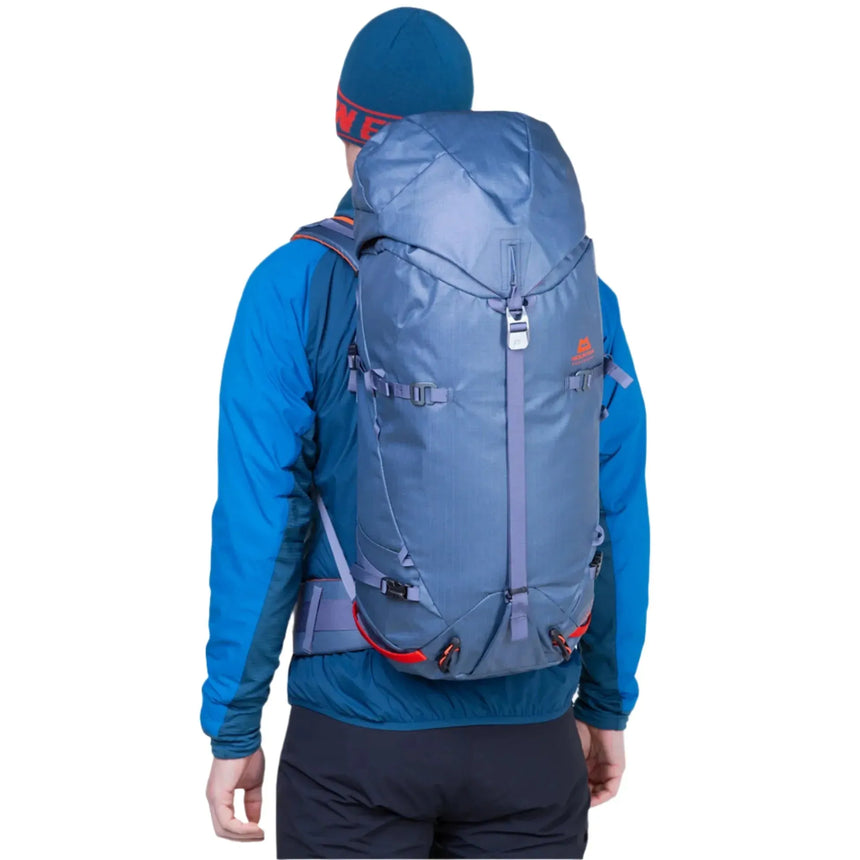 Mountain Equipment Fang 35+ Backpack Outdoor Action Alaskan Blue - back fit on model