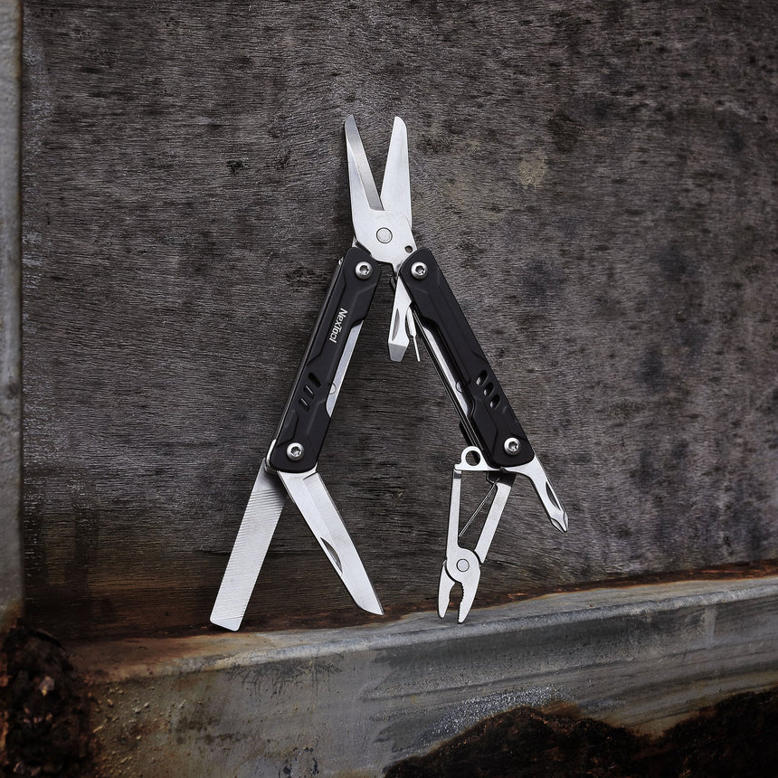 Nextool Mini Sailor Scissors Version in Use - Perfect for Desk Work and On-the-Go Tasks