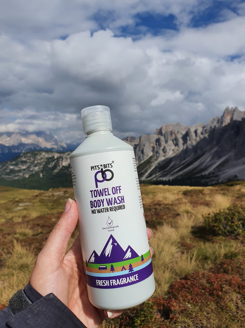 Pits & Bits® Towel Off Fresh Fragrance Body Wash 500ml - Model Holding 500ml Bottle