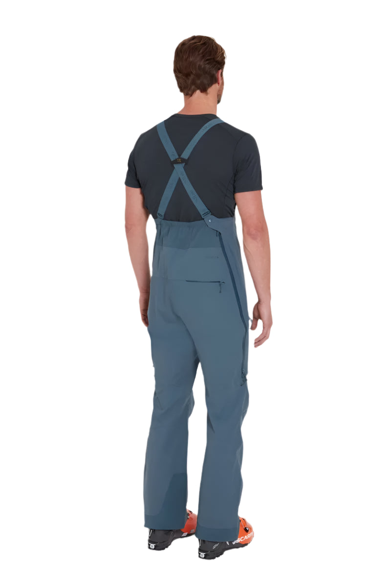 Rab Men's Khroma Kinetic Waterproof Bib Pants in Orion Blue - worn, back
