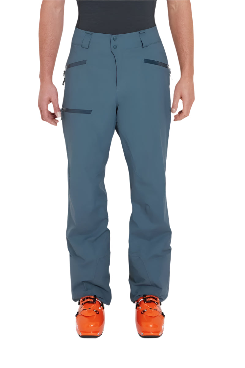 Rab Men's Khroma Kinetic Waterproof Ski Pants in Orion Blue - worn, front, cropped