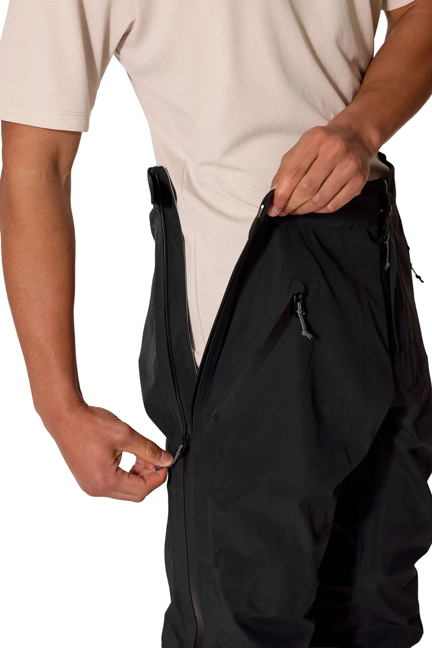 Rab Men's Firewall Guide Waterproof Pants in Black - side zip detail on model