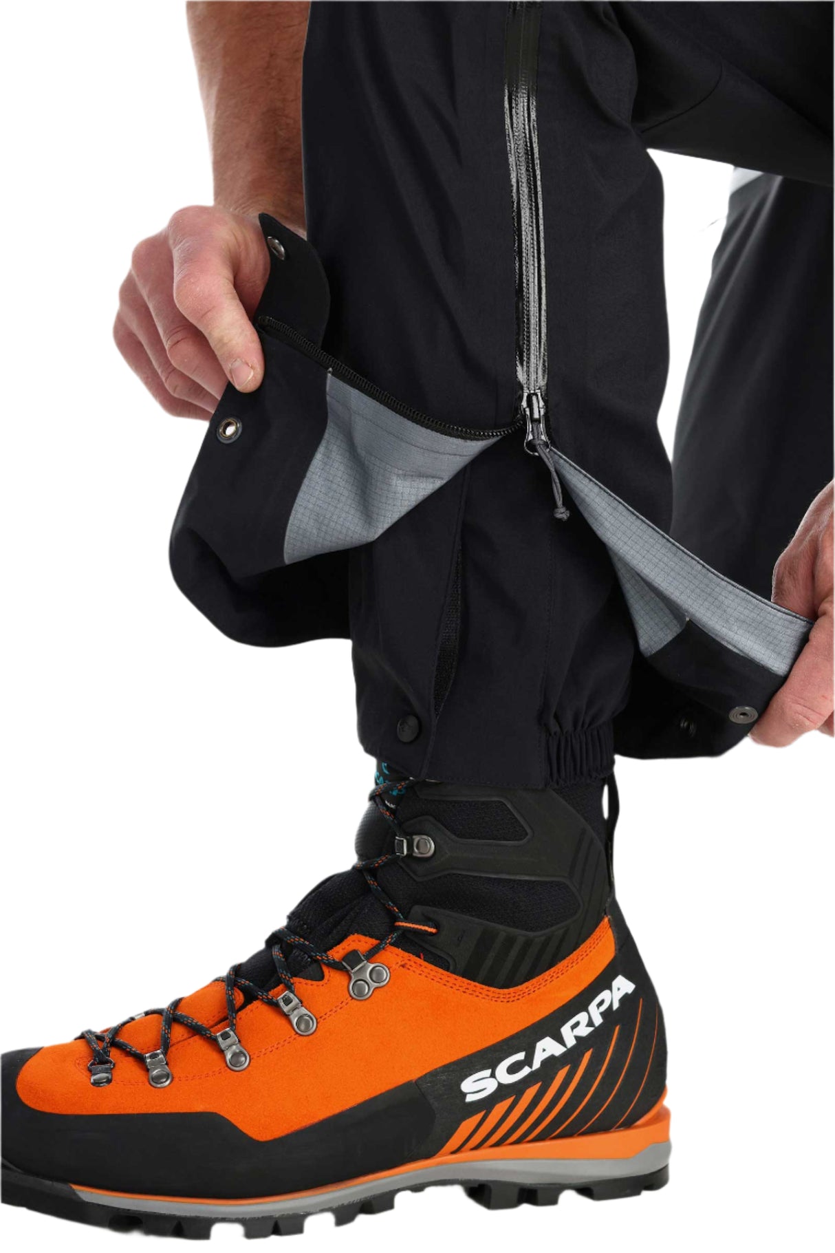 Rab Men's Latok GORE-TEX Pro Bib Pants in Black - hem gaiter detail, worn