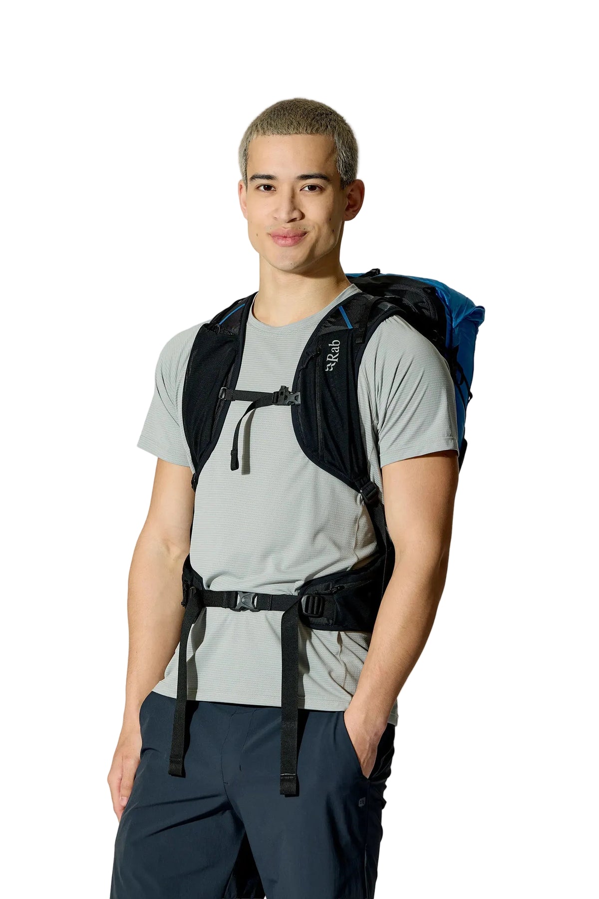 Rab Syclon XP 30L Waterproof Pack in Black/Maya Blue - Three Quarter View On Model