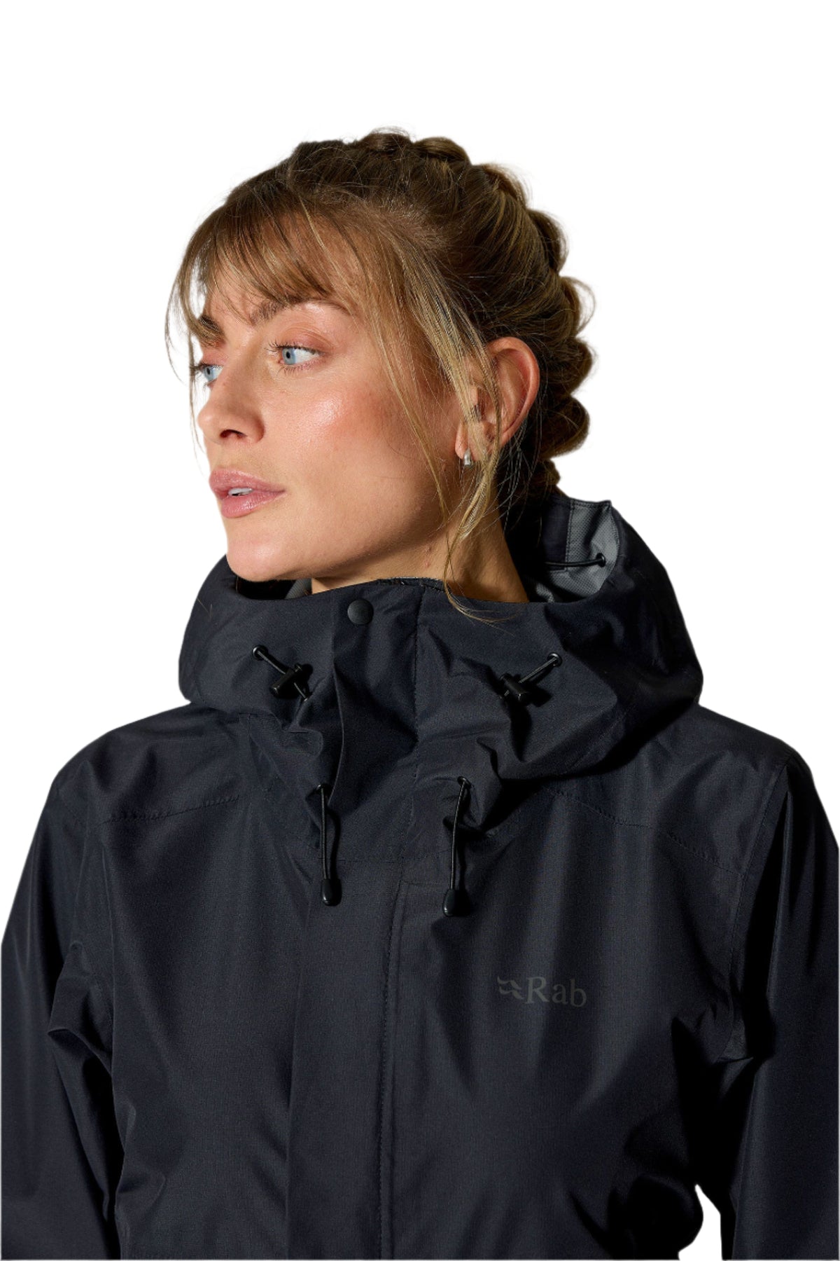 Rab Women's Downpour Waterproof Jacket in Black - worn, three-quarter
