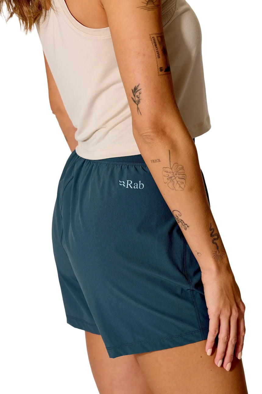 Rab Women's Momentum Shorts in Orion Blue - on model, side profile