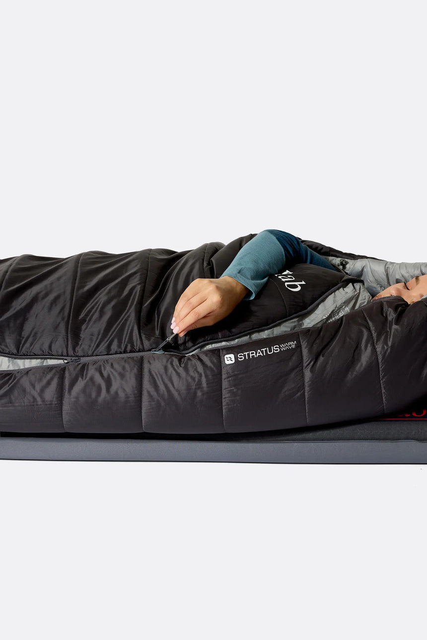 Rab Women's Radeon Synthetic Sleeping Bag (-6°C/20F) in Dark Fig Green/Graphene - worn, side sleeping