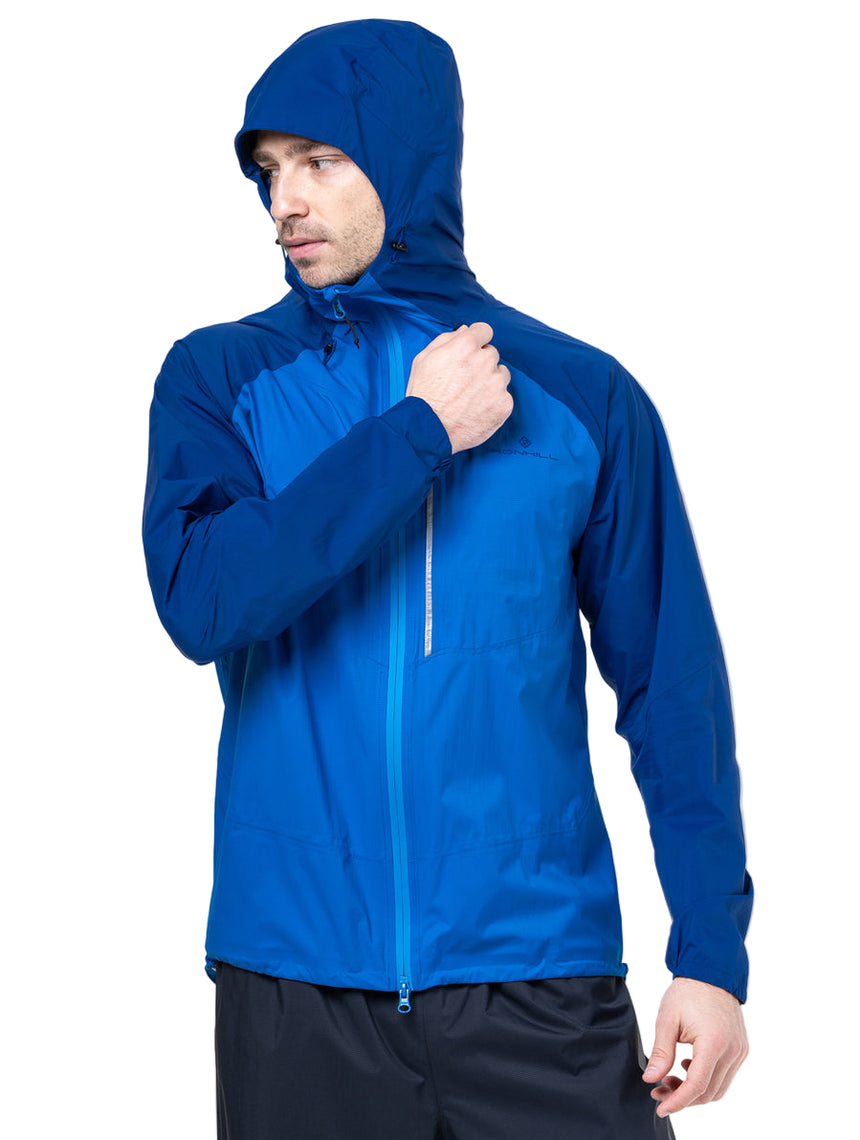 Ronhill Men's Tech Storm Jacket in Ocean/Electric Blue - roll-away hood detail