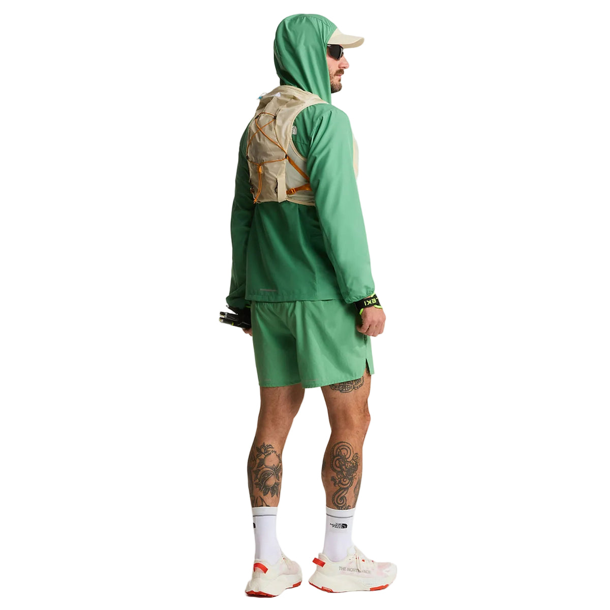 The North Face Sunriser Run Vest 8 in Desert Stone/Rust Orange - worn, side, full body
