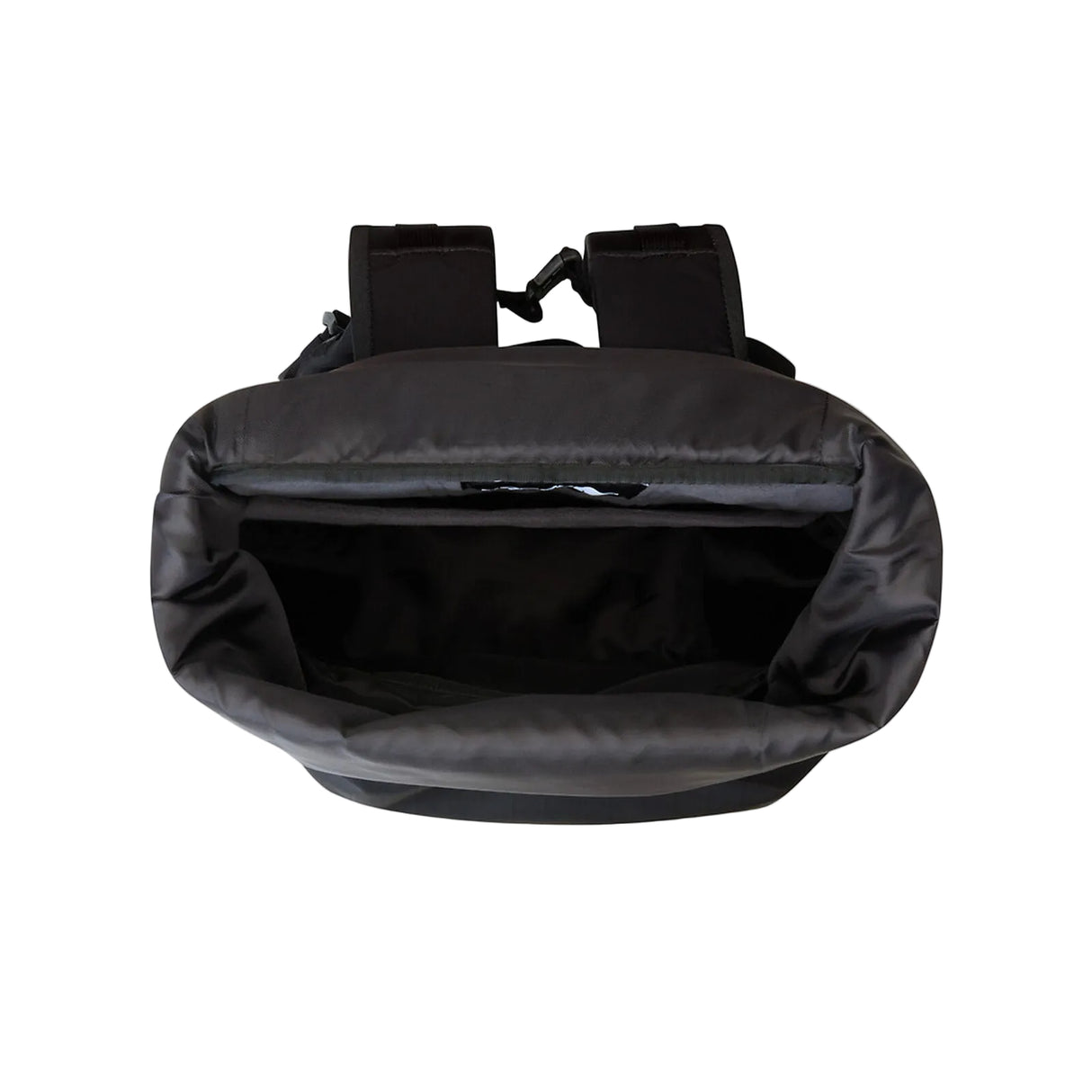Interior view of The North Face Base Camp Voyager Roll Top Backpack showing fleece-lined laptop compartment