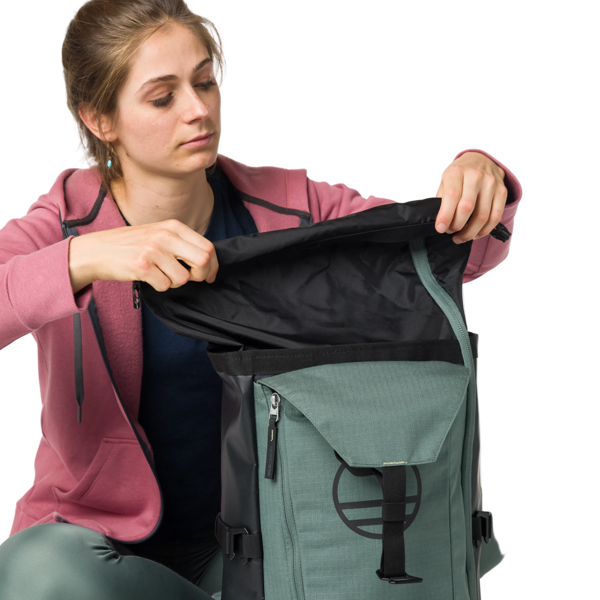 Wild Country Climbing Crag Hauler 25 Backpack Black/Marsh - model demonstrating roll-top closure