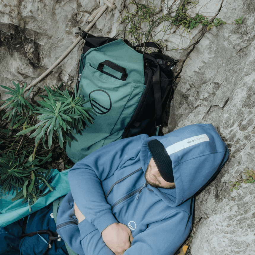 Wild Country Climbing Crag Hauler 40 Backpack Outdoor Action Black/Marsh - model laying next to pack