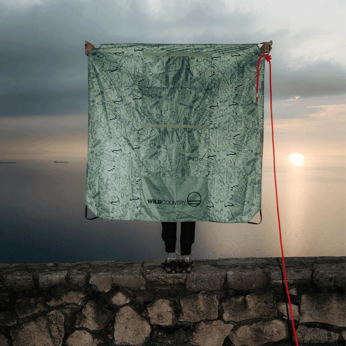 Wild Country Climbing Rope Tarp Model Holding Full Tarp Open