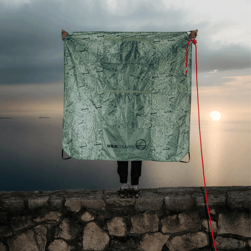 Wild Country Climbing Rope Tarp Model Holding Full Tarp Open