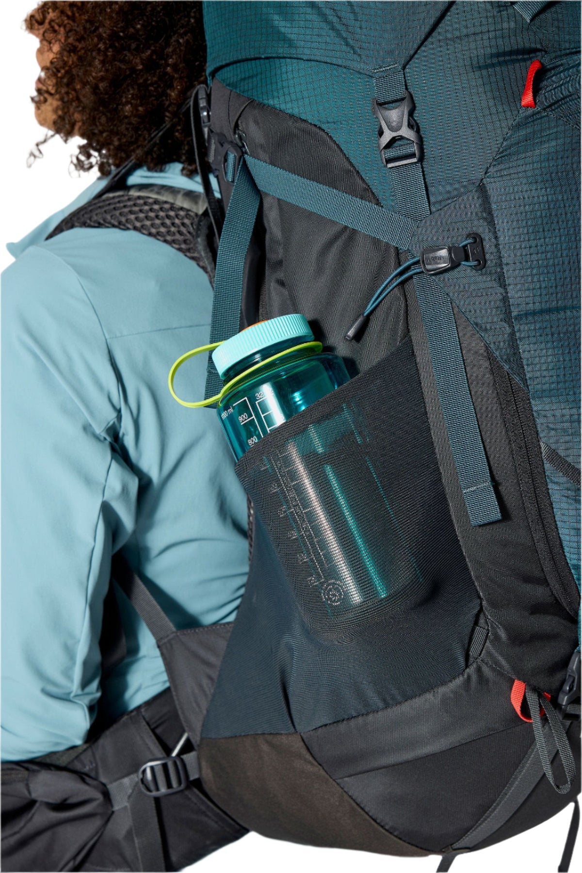 Rab Women's Hyperon ND65L Trekking Pack in Orion Blue/Anthracite - side stretch pocket with water bottle