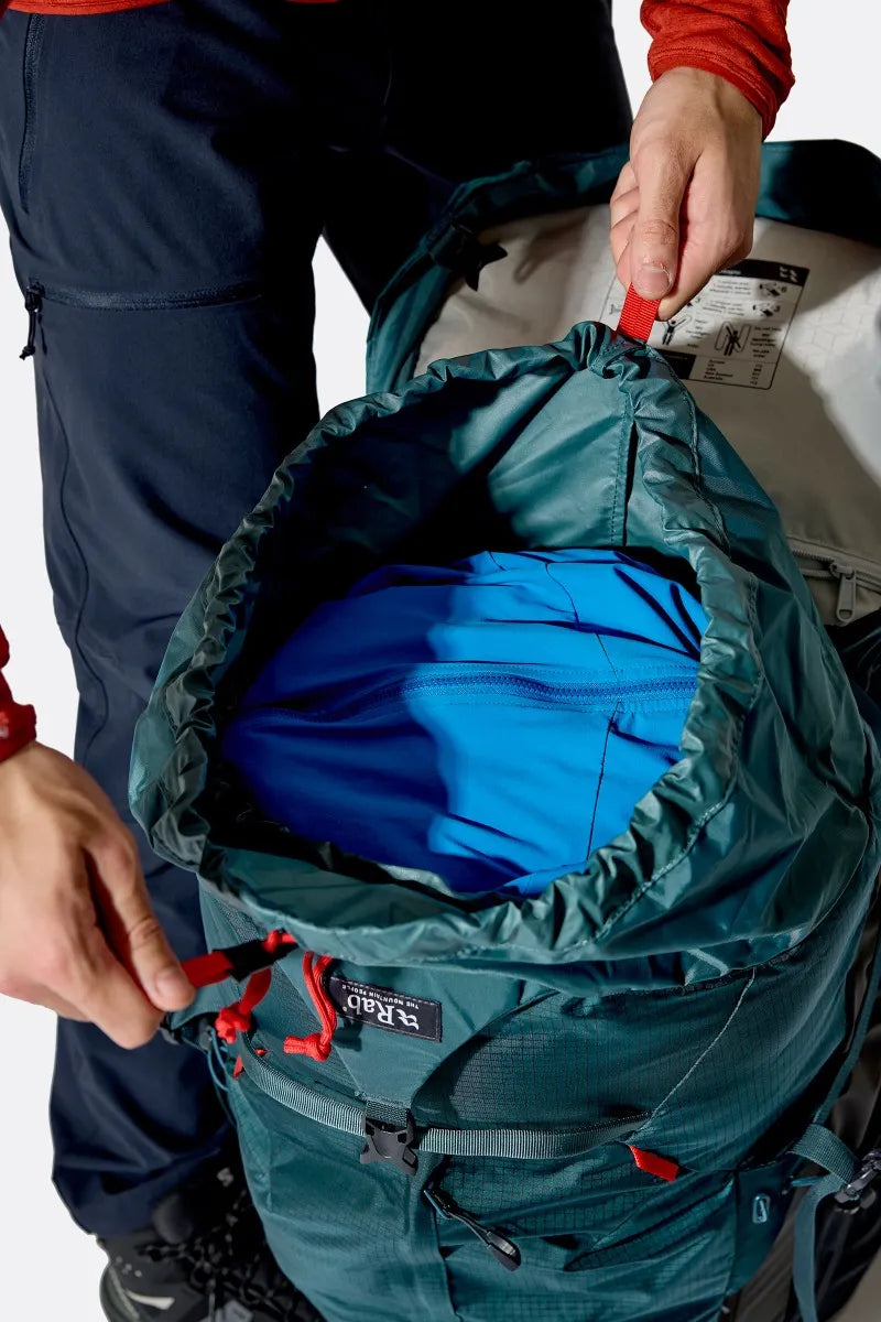 Rab Hyperon 80L Trekking Pack in Orion Blue/Anthracite - main compartment, worn