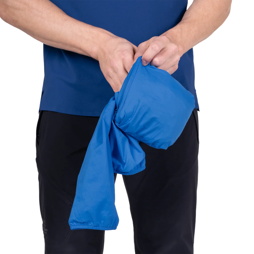 Adjustable hem drawcord detail on Mountain Equipment Aerofoil Hooded Men's Jacket in Atlantic Blue for use under a harness or rucksack waistbelt