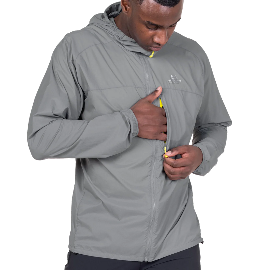 Zipped chest pocket detail on Mountain Equipment Aerofoil Hooded Men's Jacket in Tufa doubling as stuff sack with twin karabiner carry loops