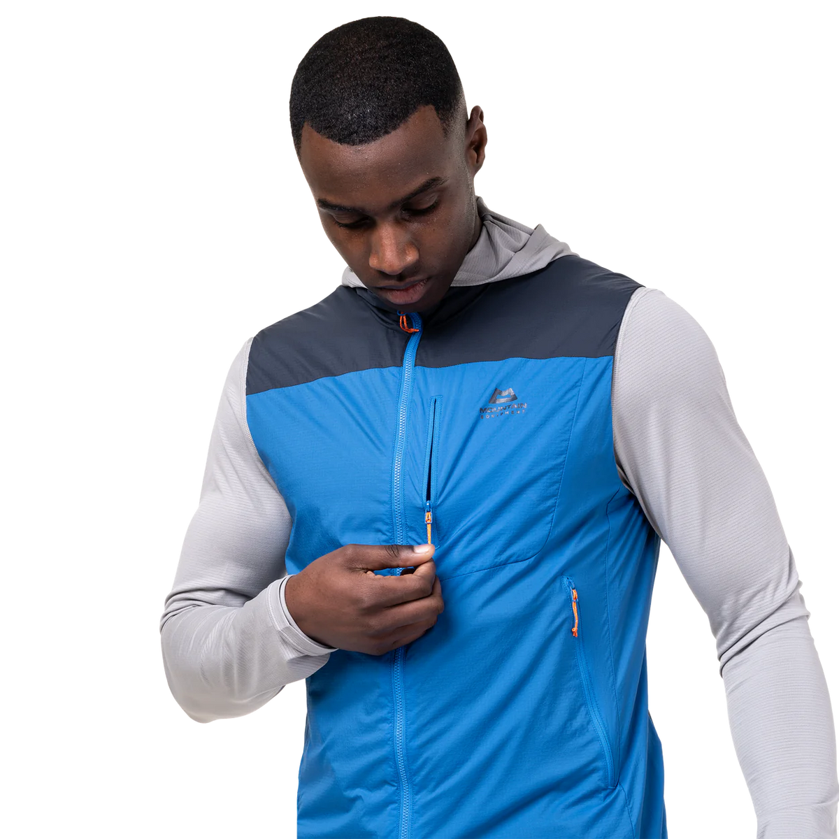 Zipped chest pocket detail on Mountain Equipment Aerotherm Men's Vest in Atlantic/Blue Nights doubling as stuff sack with twin karabiner carry loops