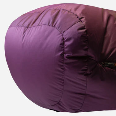 Mountain Equipment Classic Eco 300 Women's Sleeping Bag in Raisin - lifestyle view showing lightweight recycled down sleeping bag for trekking and alpine climbing