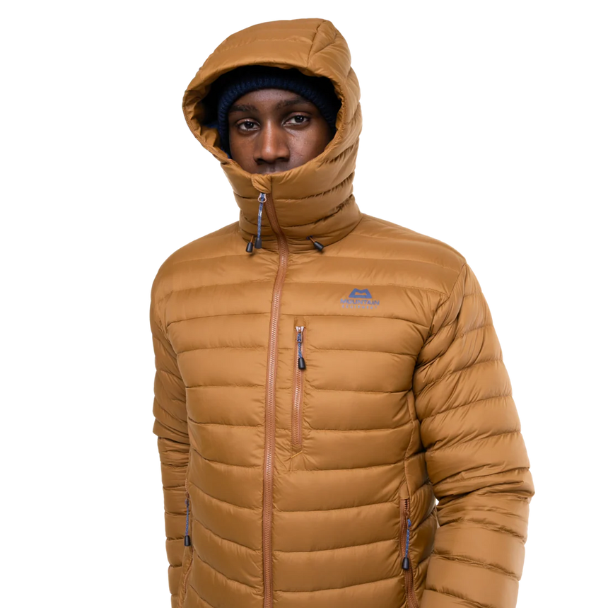 Mountain Equipment Earthrise Hooded Men's Jacket in Walnut packed into hand pocket showing twin karabiner carry loops