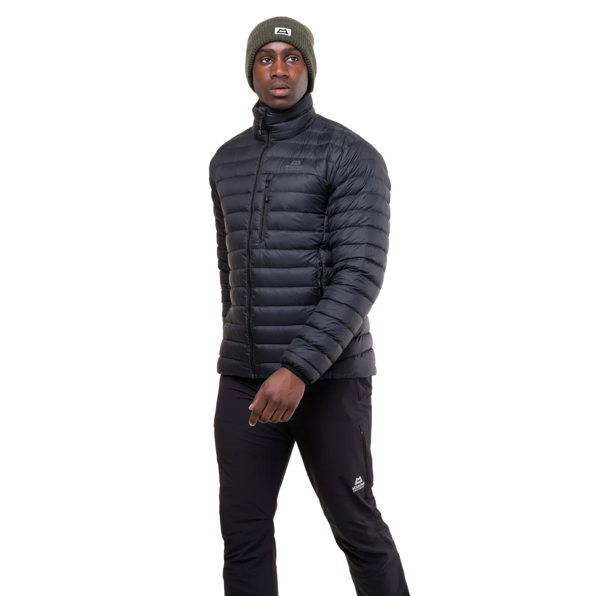 Mountain Equipment Earthrise Men's Jacket in Black - side view showing fit and dual tether hem drawcords