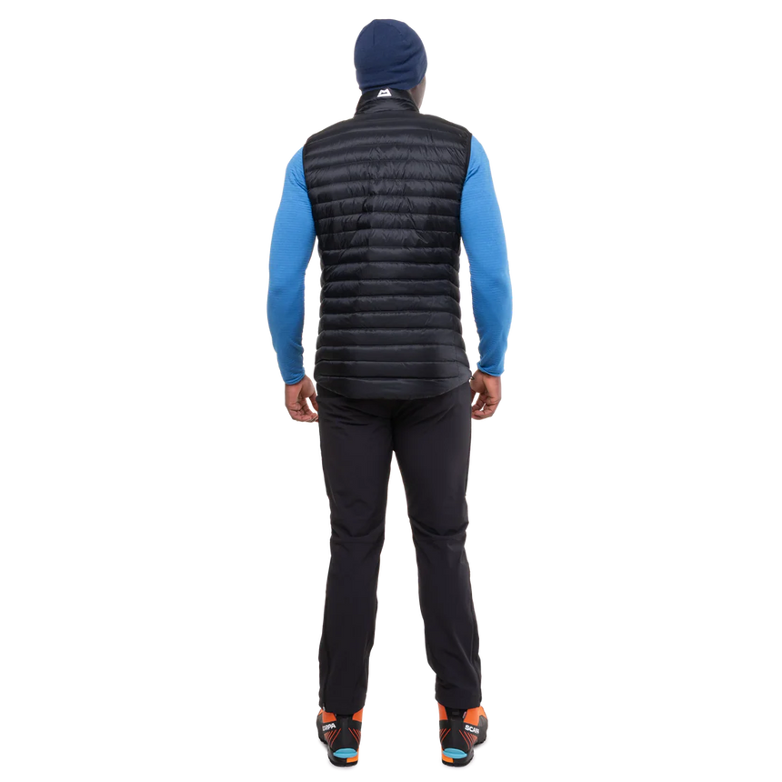 Mountain Equipment Frostline Men's Vest in Black worn on model - full length back view showing DRILITE Loft 20D shell and adjustable hem drawcords