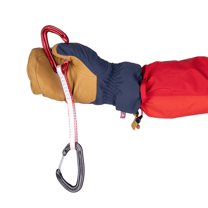 Reversed suede nose wipe detail on Mountain Equipment Guide Mitt in Cosmos/Tan