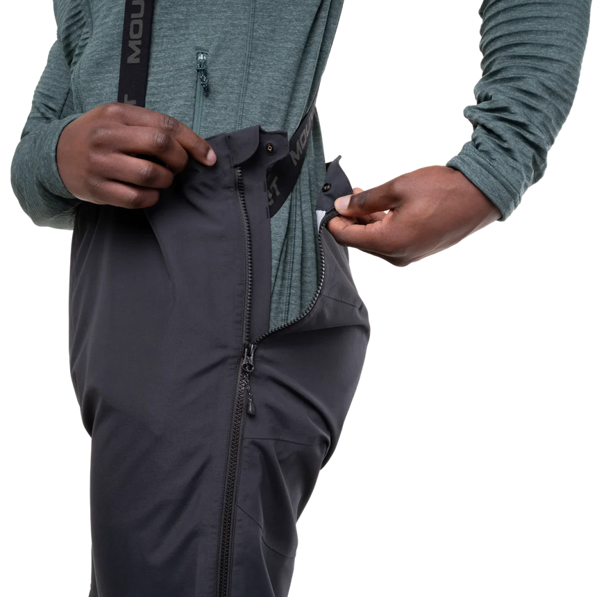 Mountain Equipment Karakoram Mountain Men's Pant in Black - left side view showing full-length two-way side zip