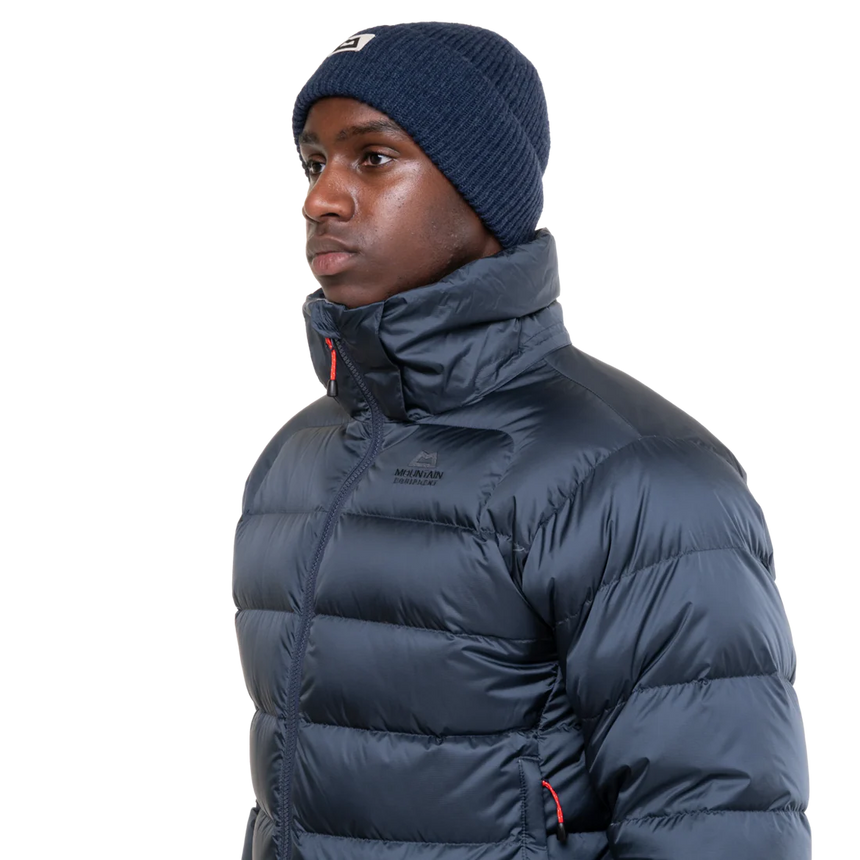 Stitch-through baffle construction detail on Mountain Equipment Lightline Men's Jacket in Blue Nights/Cosmos showing 700 fill power down insulation