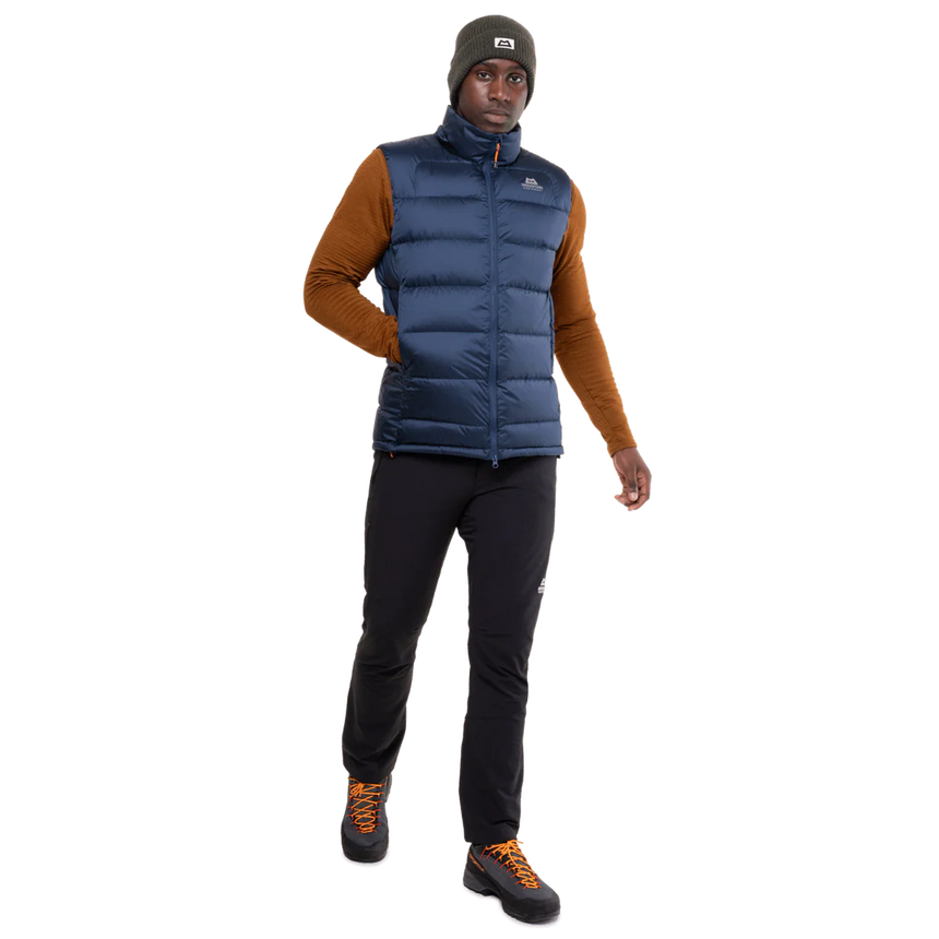 Mountain Equipment Lightline Men's Vest in Navy - detail view showing zipped hand warmer pocket and Drilite Loft windproof outer fabric