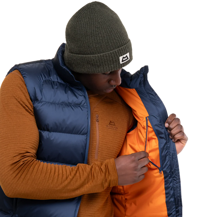 Mountain Equipment Lightline Men's Vest in Navy - detail view showing 2-way YKK moulded centre front zip and internal baffle construction