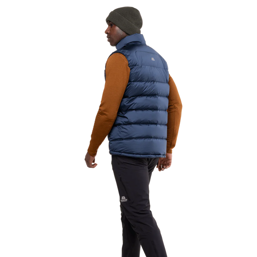 Mountain Equipment Lightline Men's Vest in Navy - detail view showing dual tether hem drawcords and stitch-through baffle construction