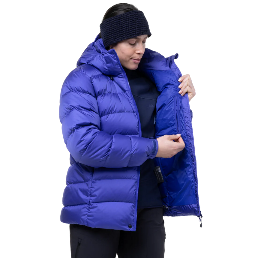 Mountain Equipment Lightline Women's Jacket in Clematis packed into stuff sack showing lightweight packable construction