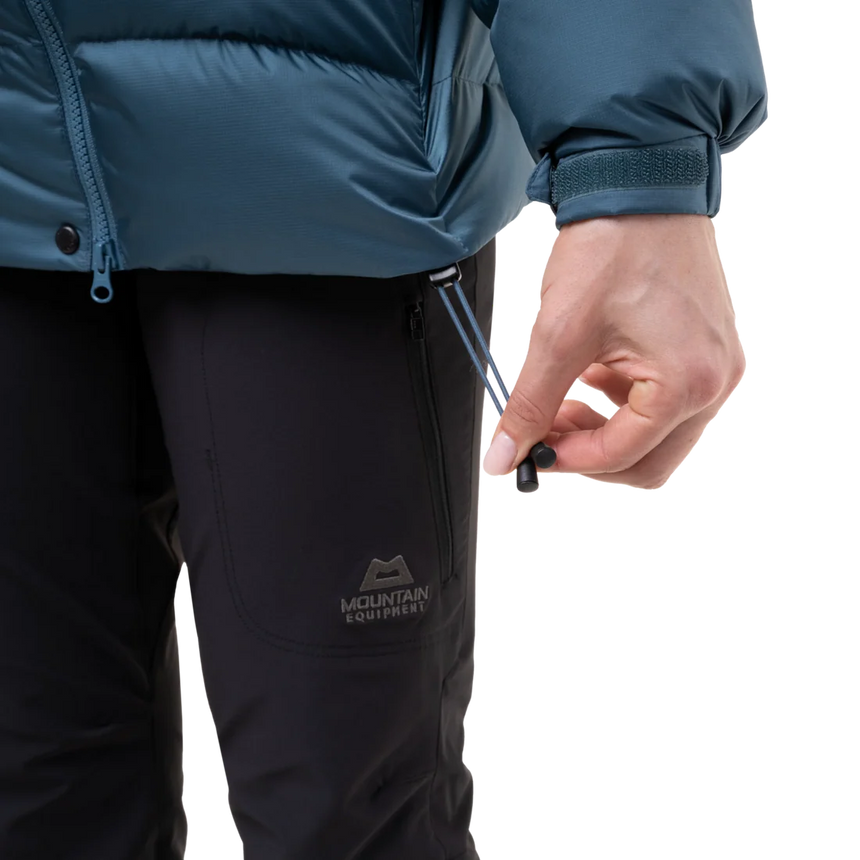 Mountain Equipment Lightline Women's Jacket in Stellar Blue - lifestyle view showing technical duvet jacket for mountaineering in sub-zero conditions