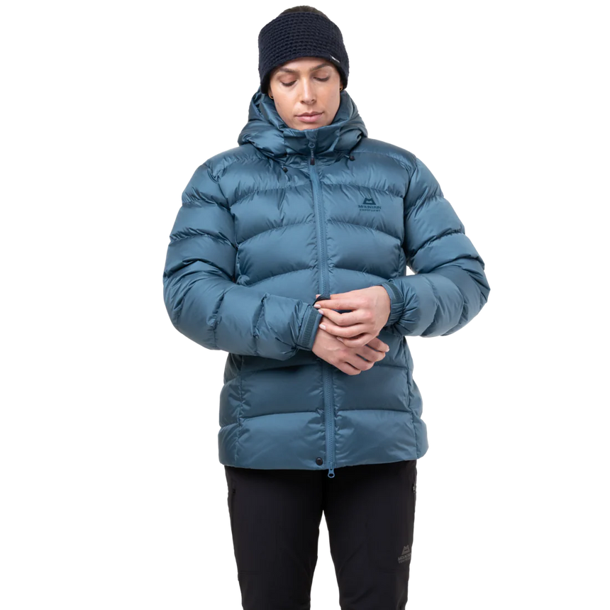 Mountain Equipment Lightline Women's Jacket in Stellar Blue packed into stuff sack showing lightweight packable construction