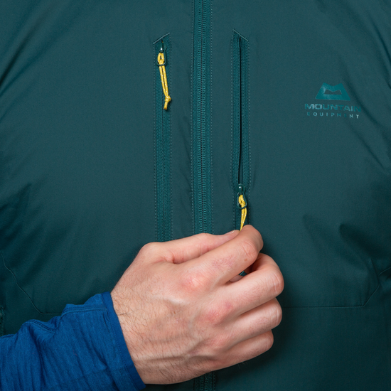Mountain Equipment Switch Men's Vest in Pine/Fern - detail view showing elasticated armhole and flatlocked seam construction