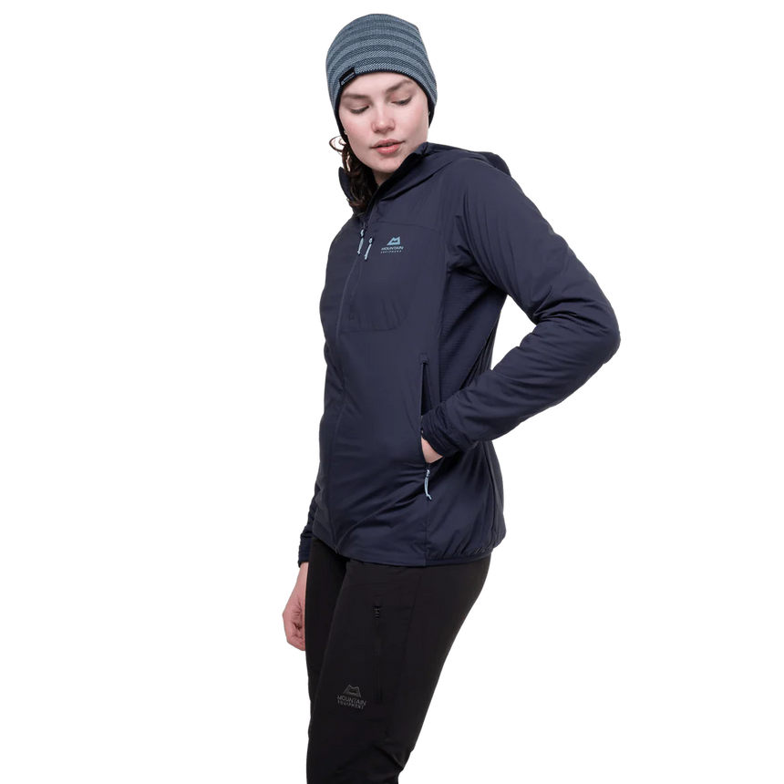 Mountain Equipment Switch Pro Hooded Women's Jacket in Cosmos packed into hand pocket showing lightweight packable construction for alpine and expedition use