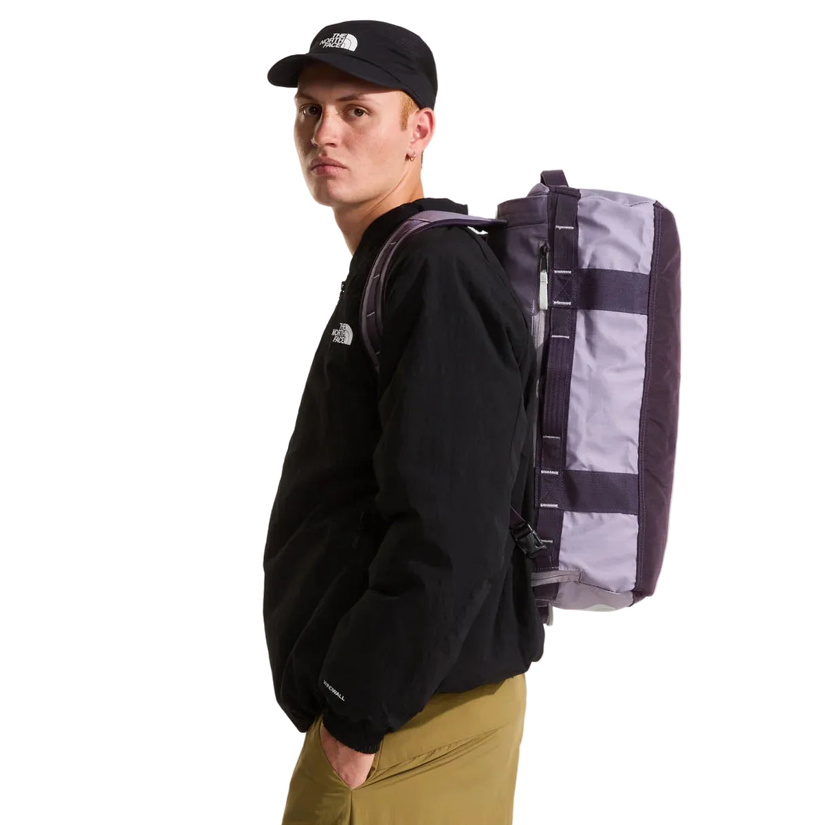 The North Face Base Camp Voyager Duffel 32L Transcendent Grey/Endless Dusk - side view with detachable padded shoulder straps and grab handles