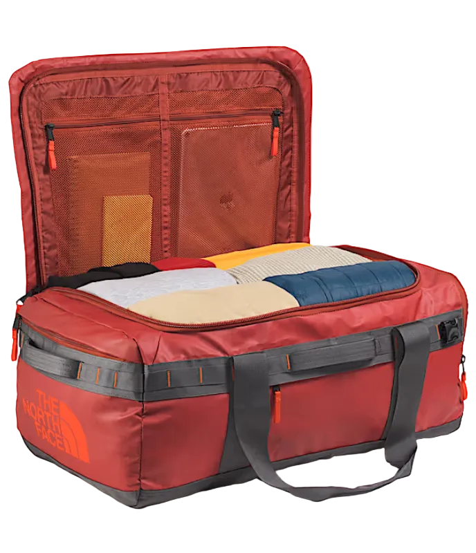 The North Face Base Camp Voyager Duffel 62L Iron Clay/Anthracite Grey/Lava Red - top view showing main compartment opening and adjustable divider