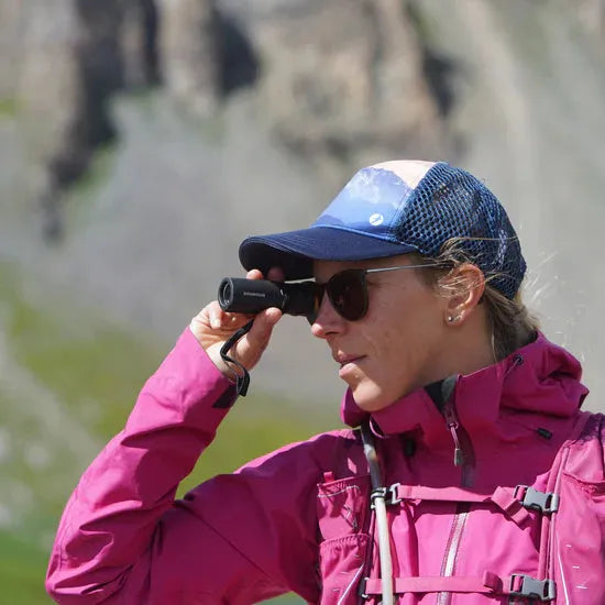 Brunton Lite Tech™ Monocular Outdoor Action - Product in Use mountain background