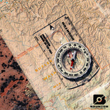 Brunton compass on a topographic map